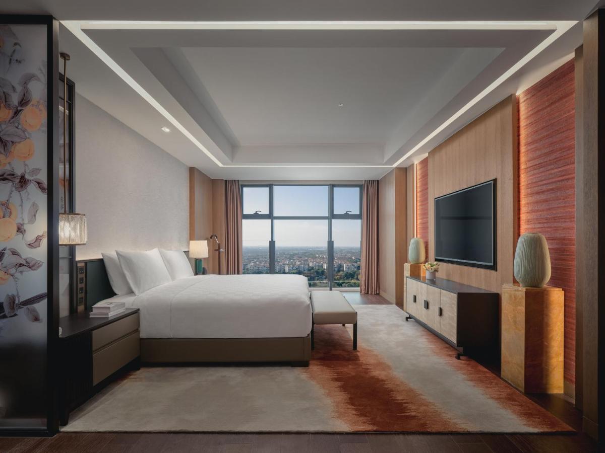 Hualuxe Kunshan Huaqiao By Ihg - F1 Racing Preferred Hotel Экстерьер фото