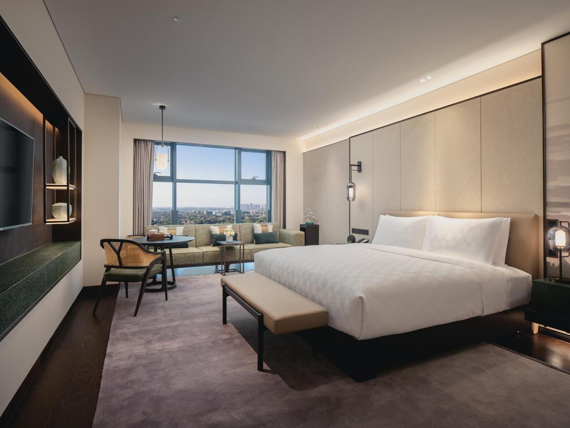 Hualuxe Kunshan Huaqiao By Ihg - F1 Racing Preferred Hotel Экстерьер фото