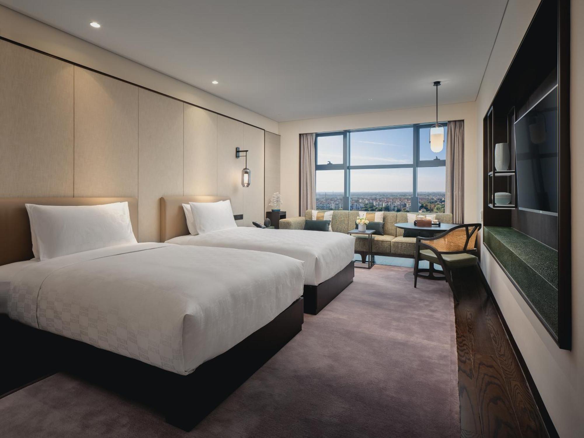 Hualuxe Kunshan Huaqiao By Ihg - F1 Racing Preferred Hotel Экстерьер фото