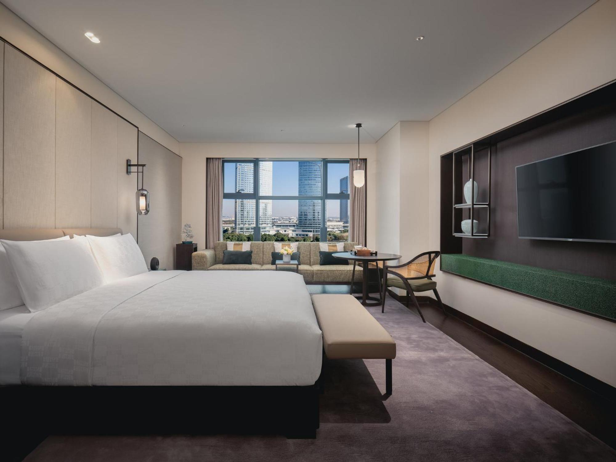 Hualuxe Kunshan Huaqiao By Ihg - F1 Racing Preferred Hotel Экстерьер фото